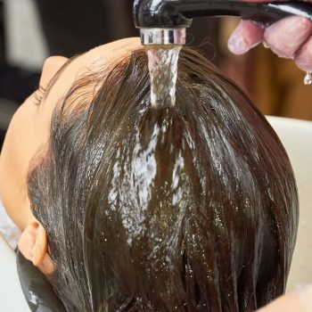 woman-getting-head-washed-macro-2024-09-20-18-25-14-utc